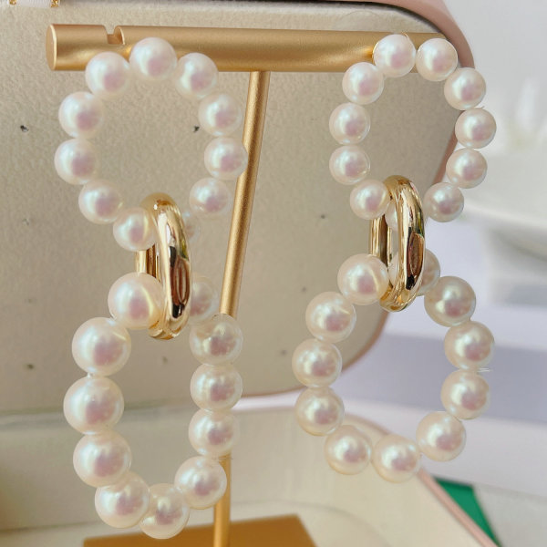 Big round glass pearl earrings