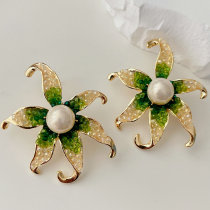 Green crystal Starfish earrings