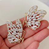 Glass pearl butterfly earrings