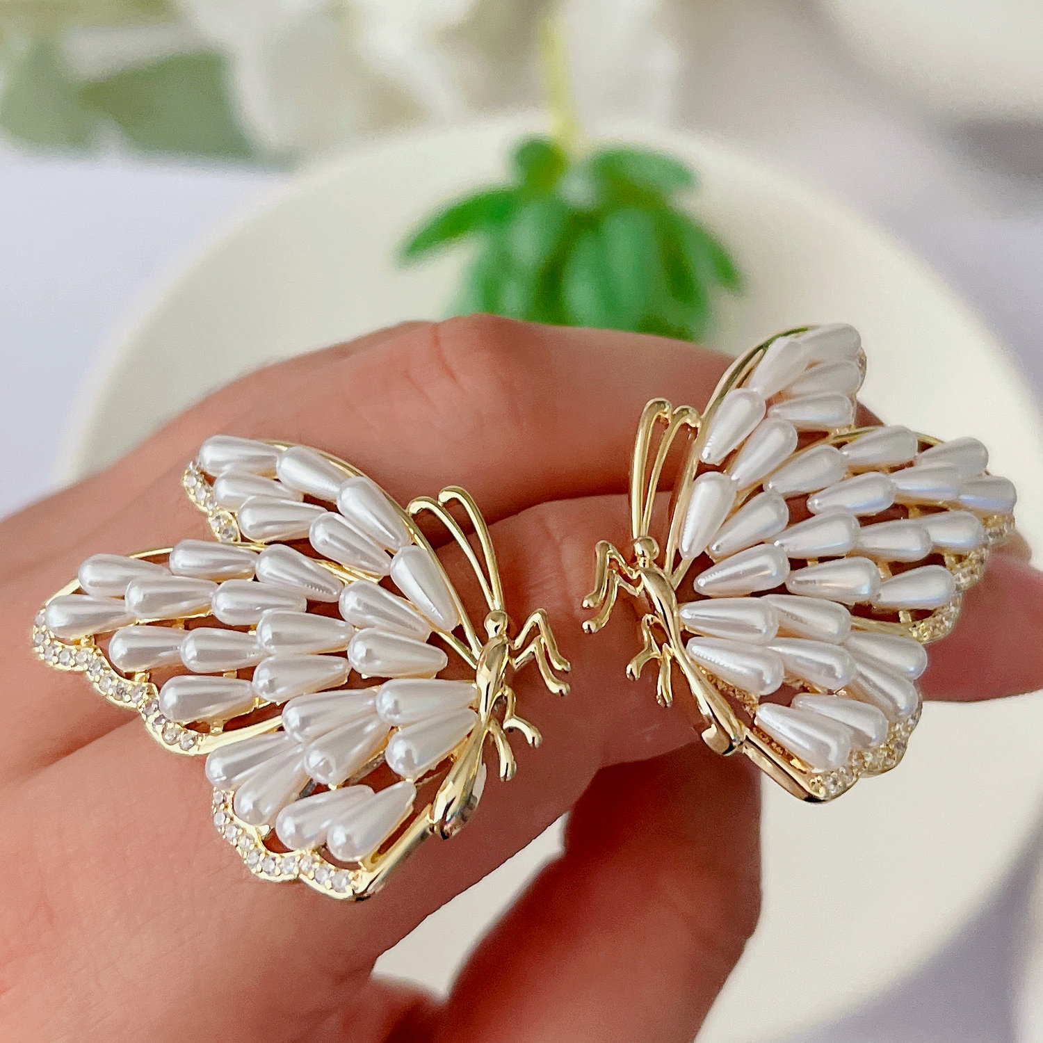 Glass pearl butterfly earrings