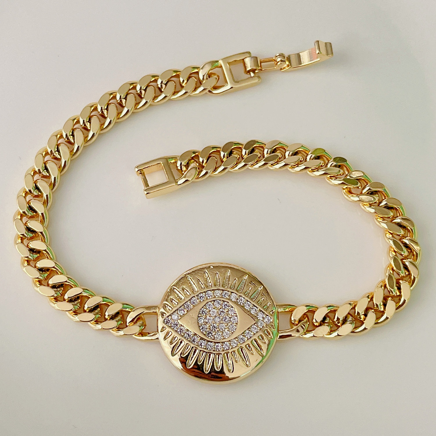 Pave eye cuban chain bracelet