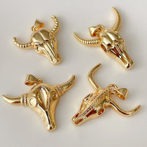 Gold metal horn charm