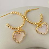 Gold bead hoop earring with Shell heart charm