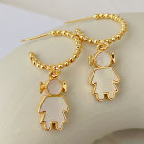 Gold beaded hoop earring with shell girl charm