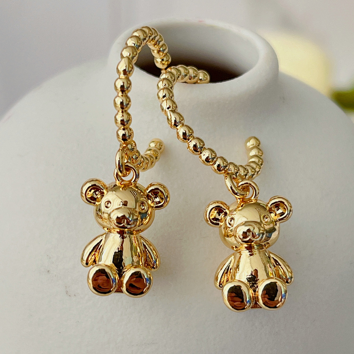 Gold beaded hoop earring with Bear charm