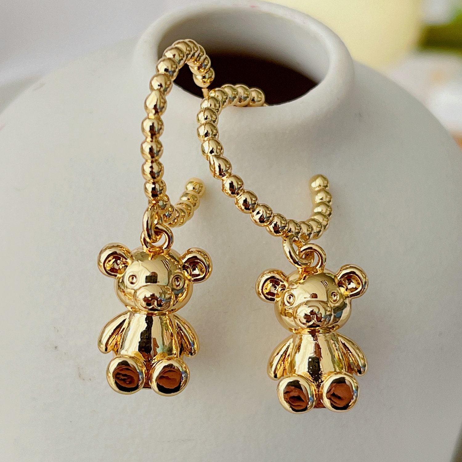 Gold beaded hoop earring with Bear charm