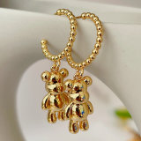 Gold bead hoop earring with teddy charm