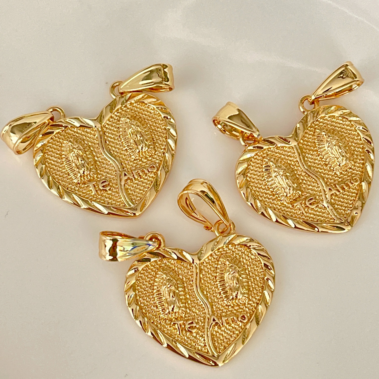 Heart religious charm