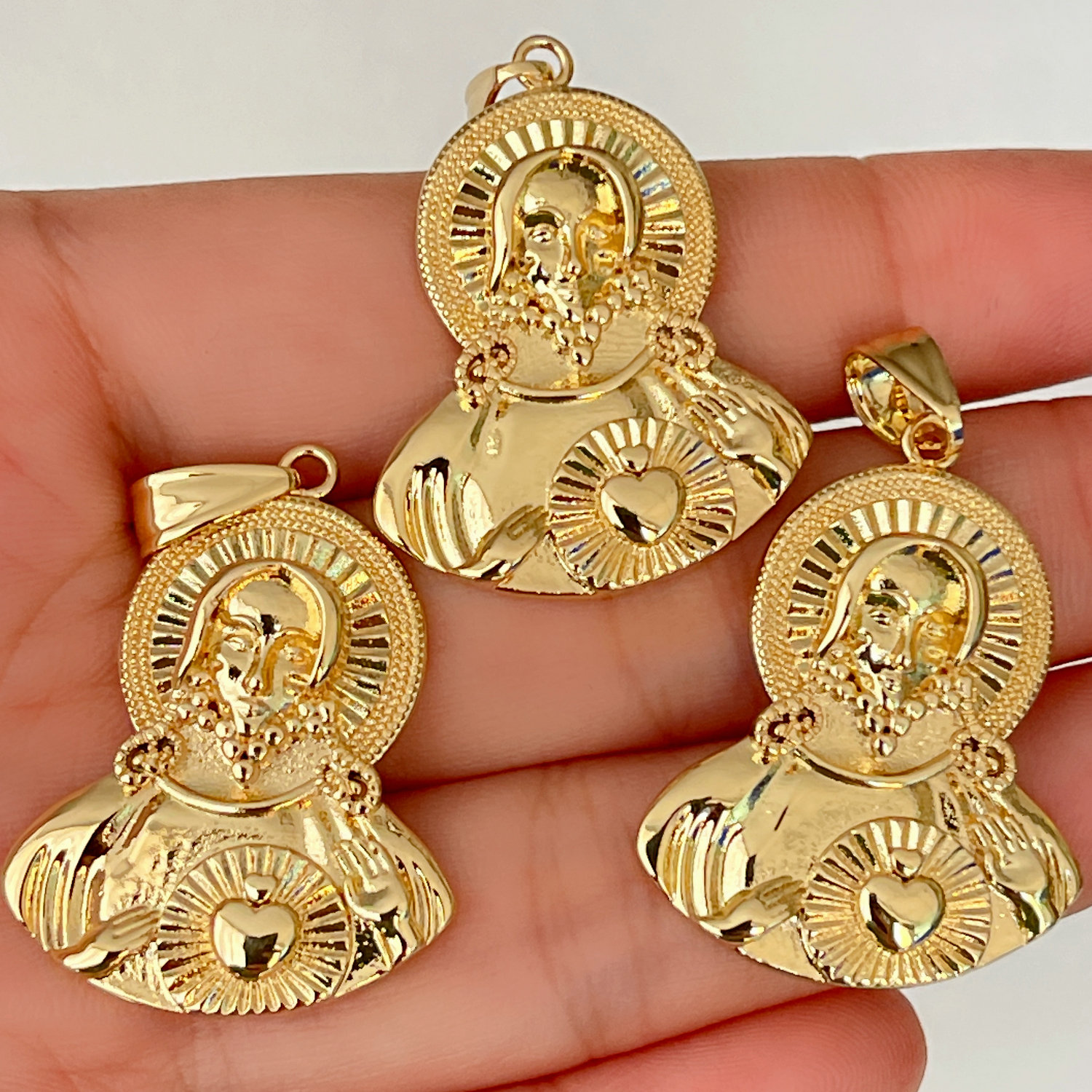 metal religious charm
