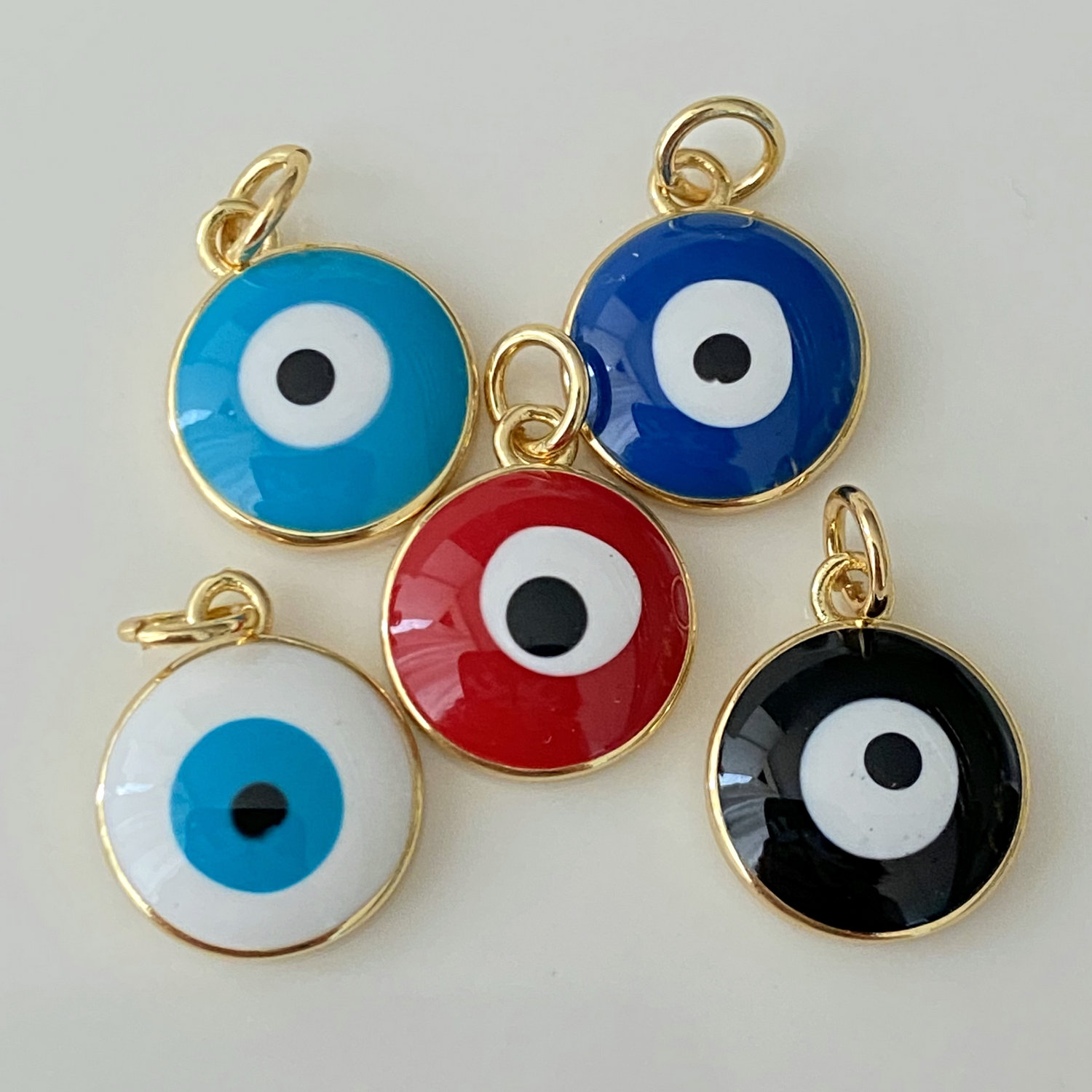 Enamel eye charm