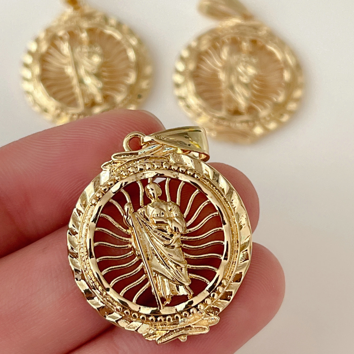 metal religious charm