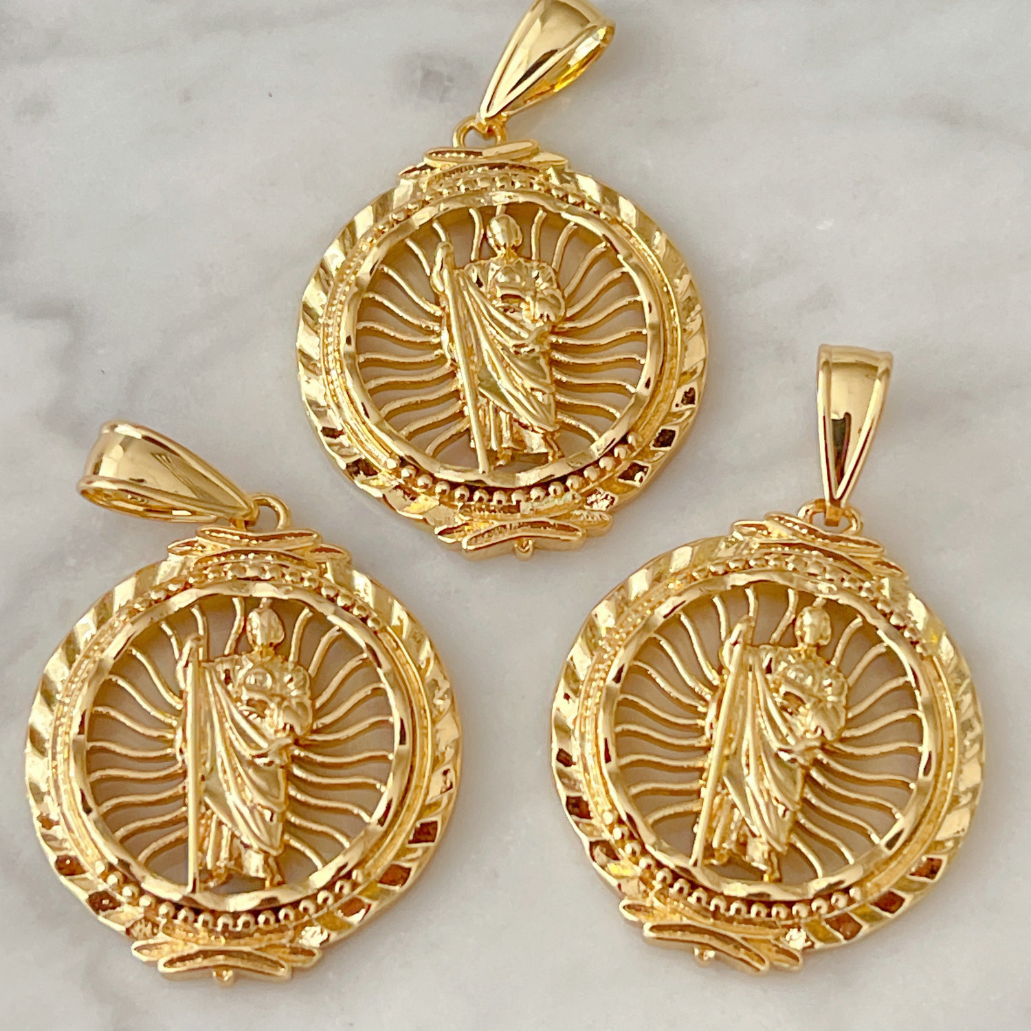 metal religious charm