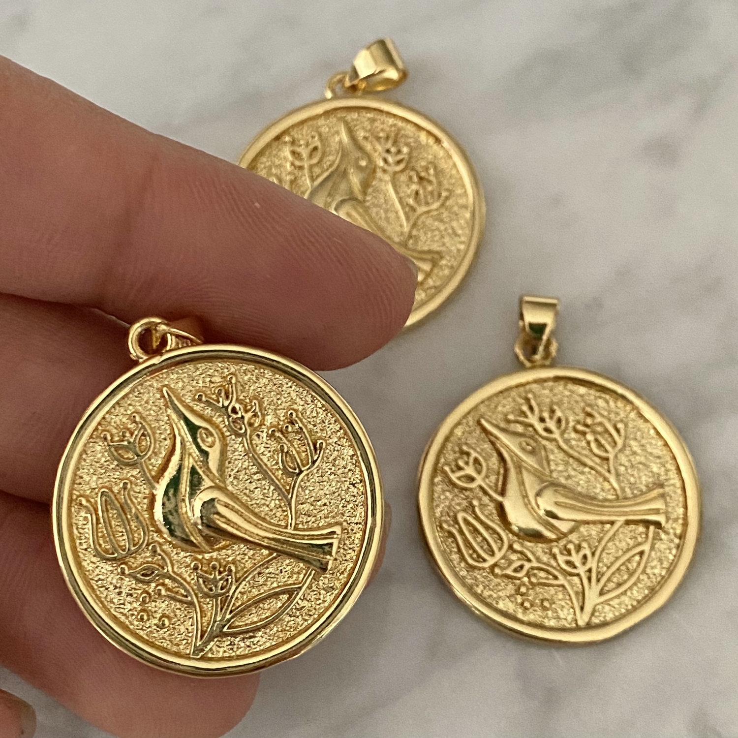 Round bird charm