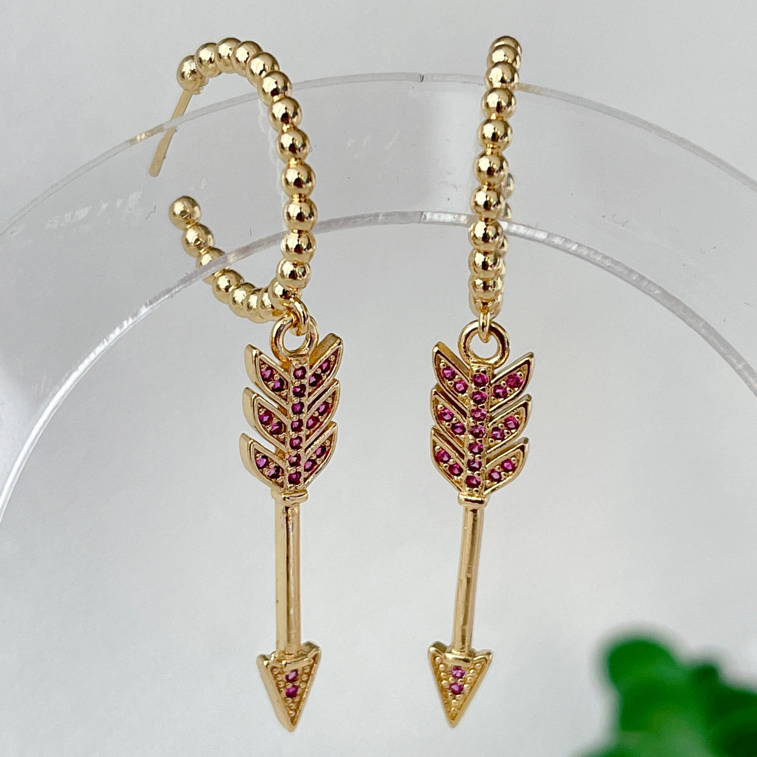 Pave gold beaded hoops earrings with arrow charm