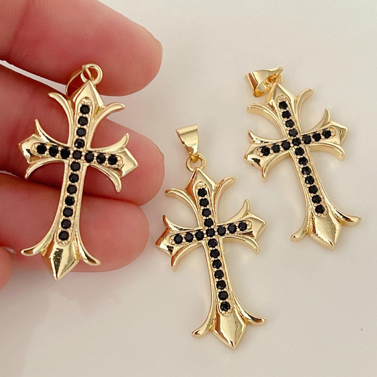 Black zircon cross charm