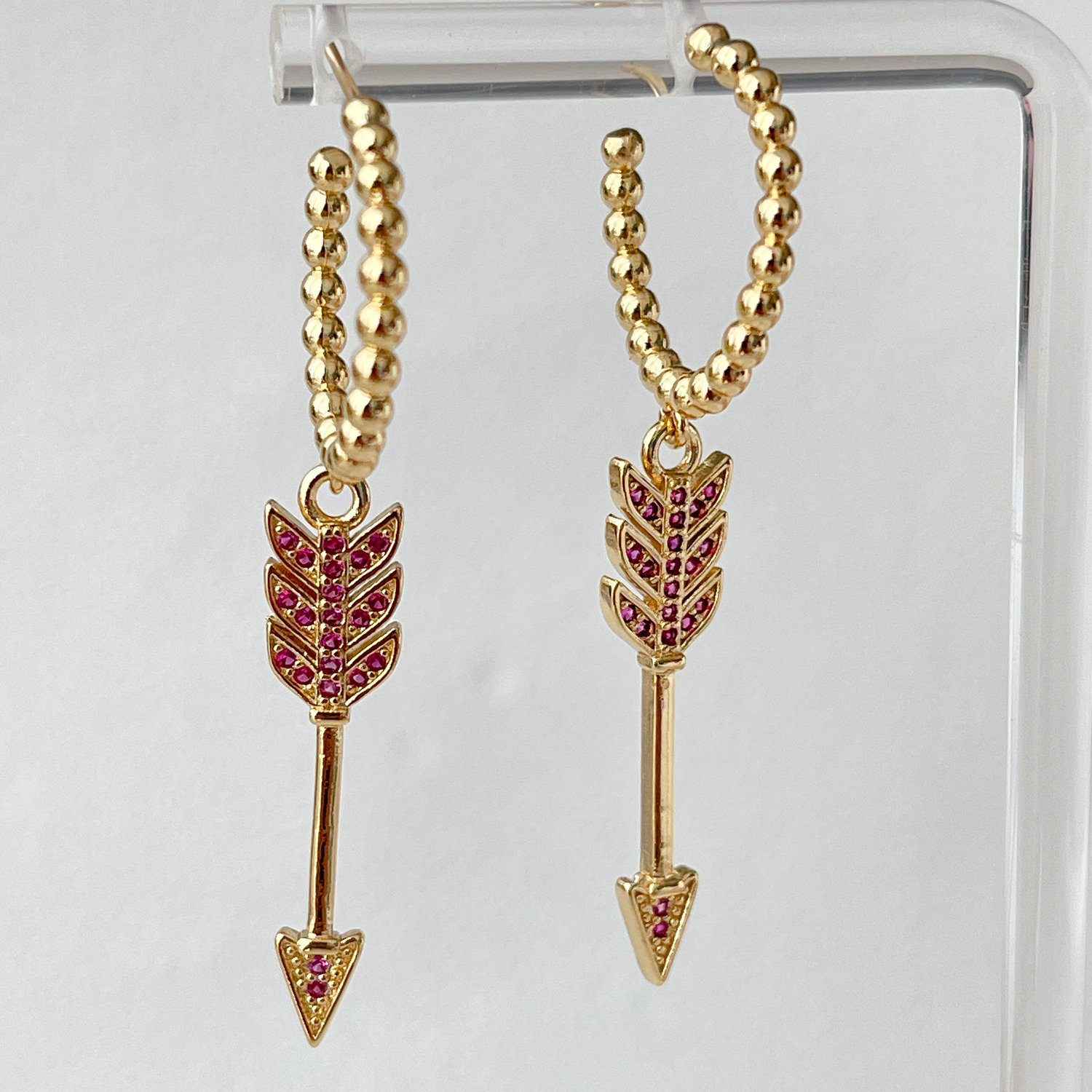 Pave gold beaded hoops earrings with arrow charm