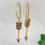 Pave gold beaded hoops earrings with arrow charm