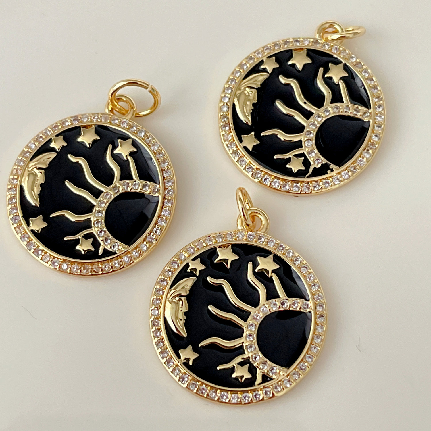 Black enamel star charm