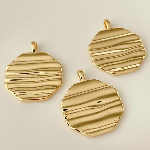 Metal wave charm
