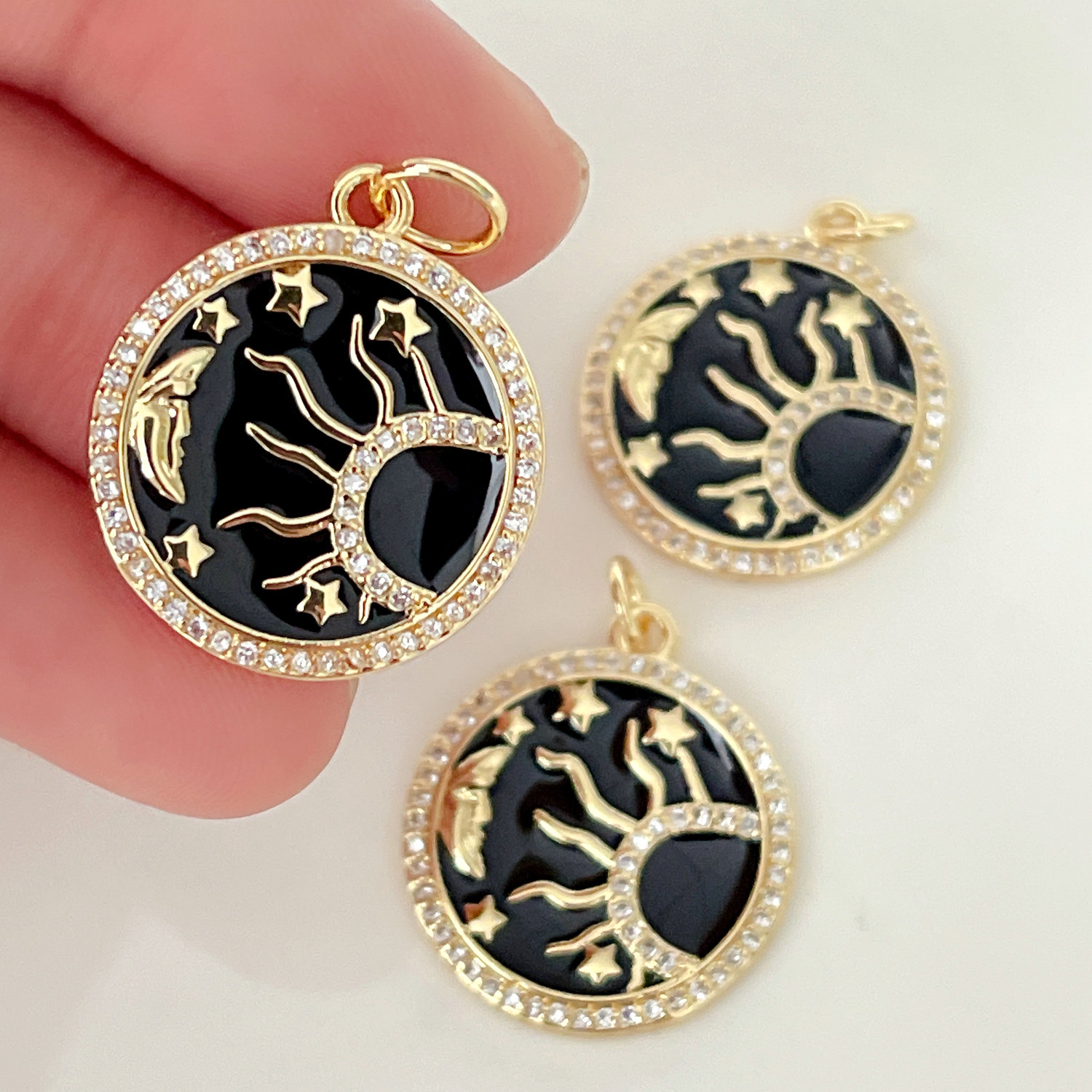 Black enamel star charm