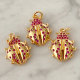 Red zircon ladybug charm