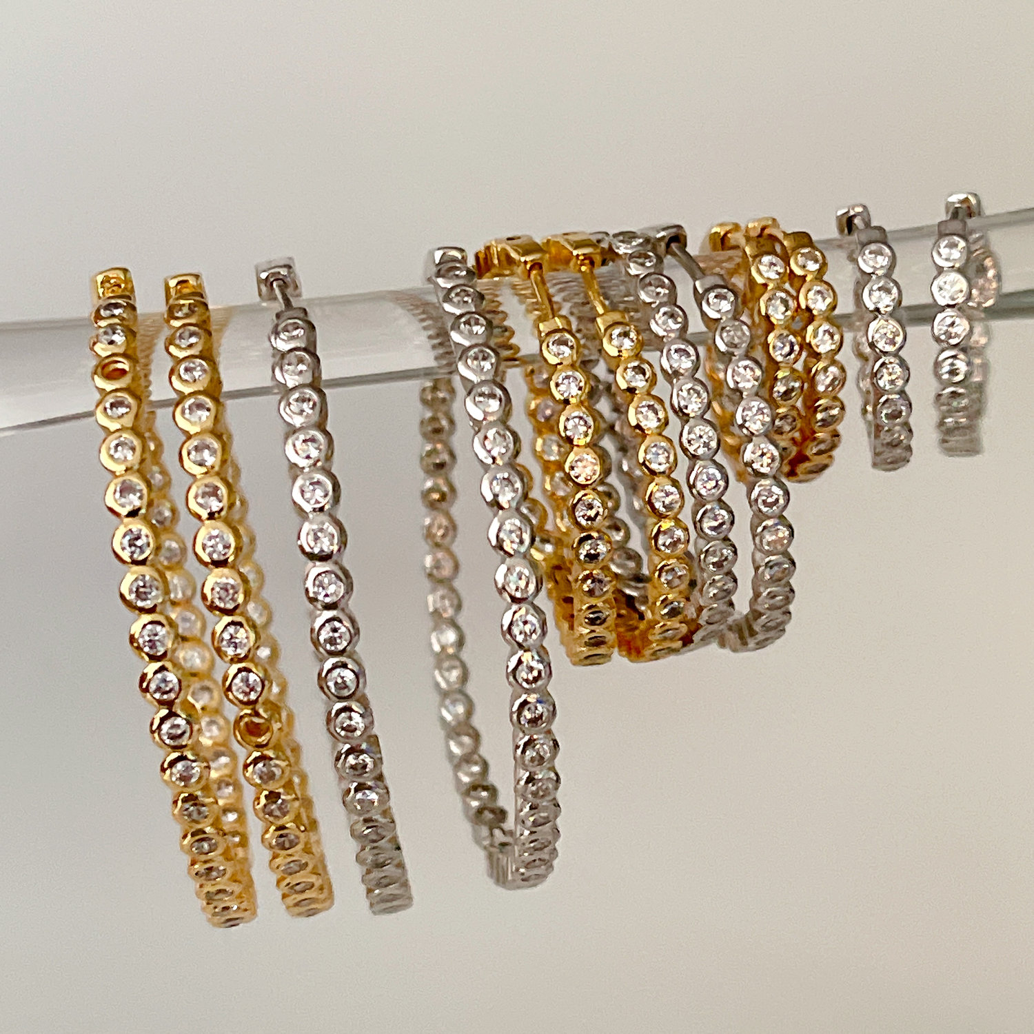 Zircon hoops earring