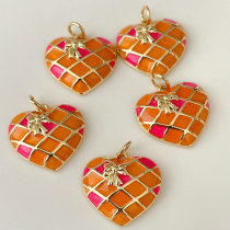 Enamel orange heart pendant