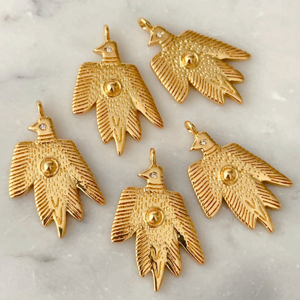 Metal bird charm