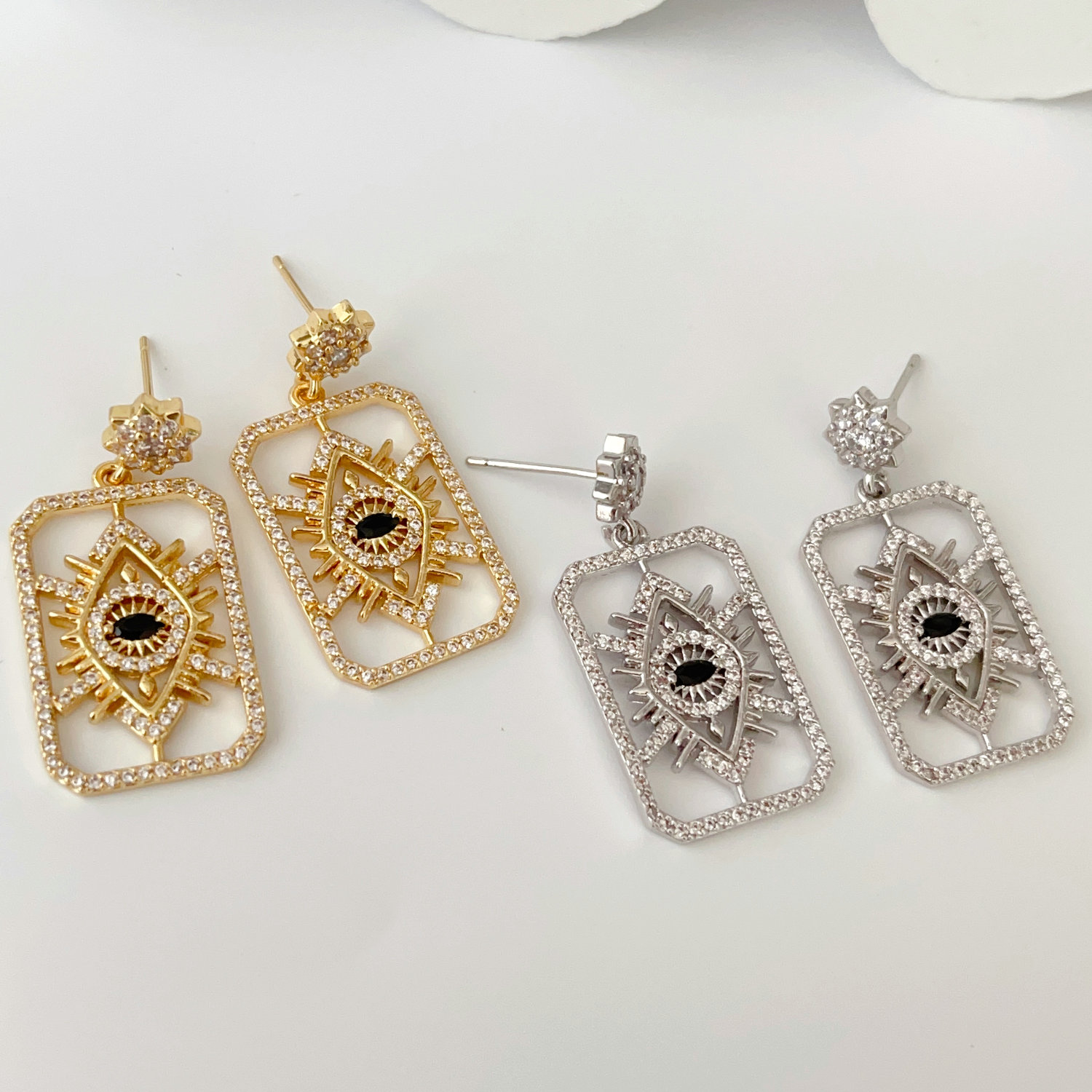 Square eye charm earrings