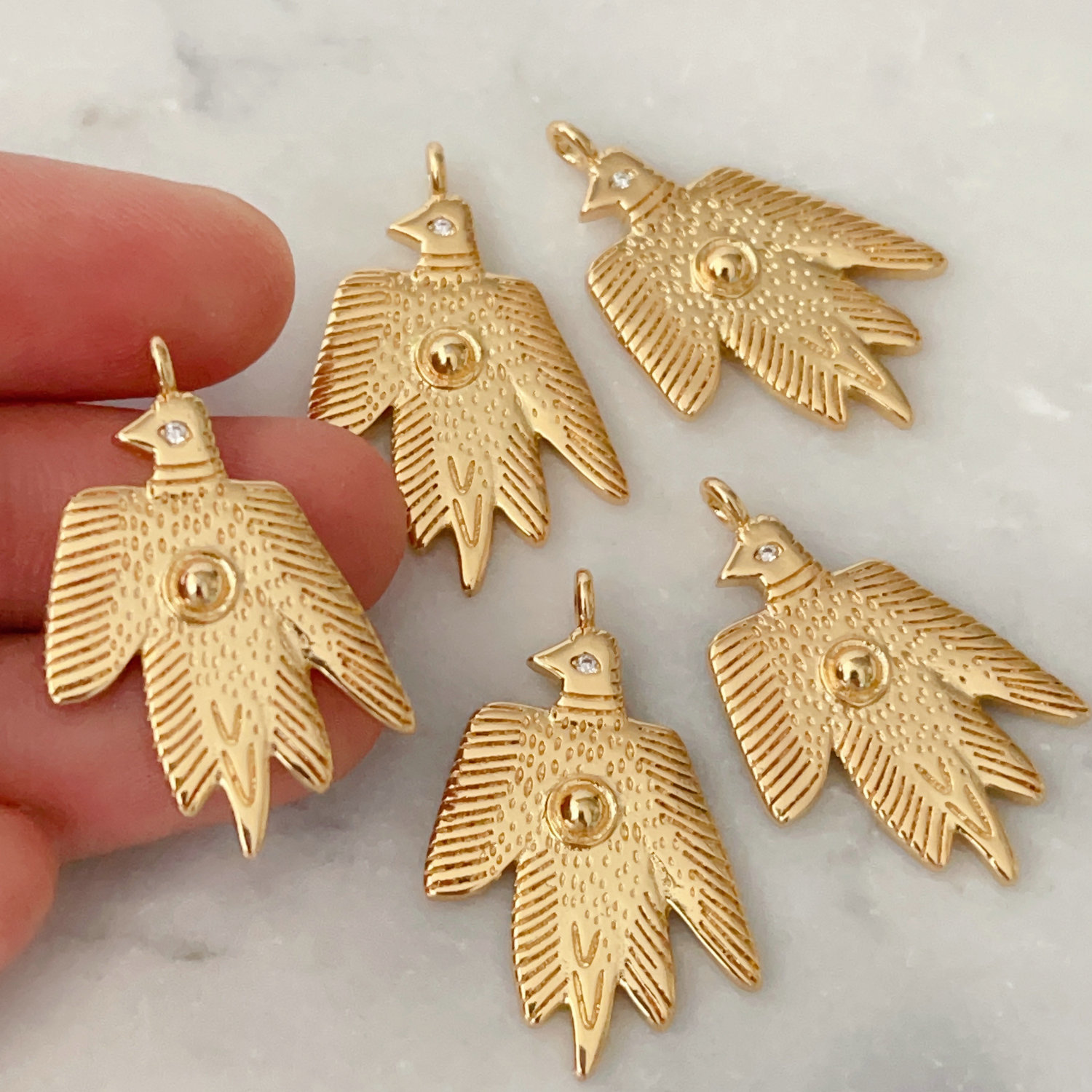 Metal bird charm