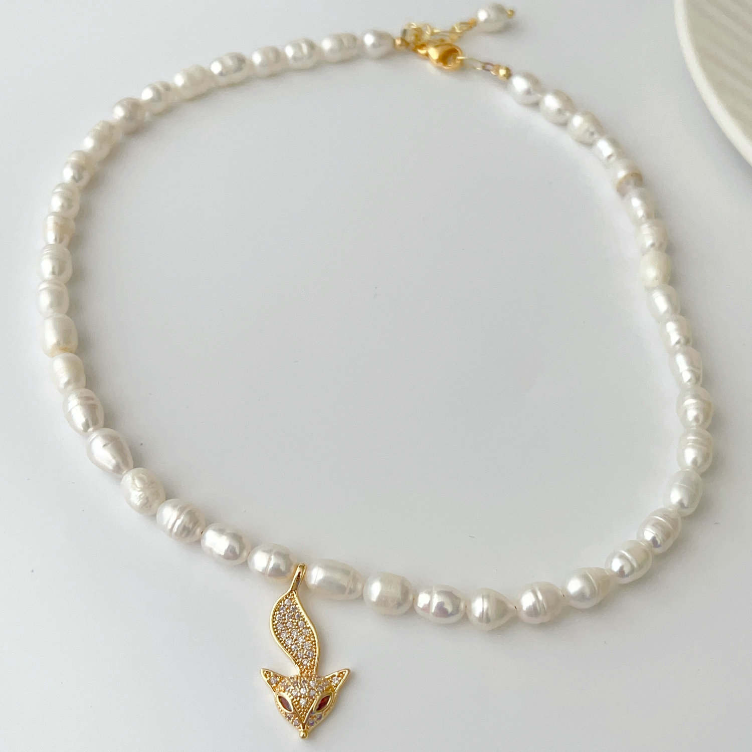 Fresh water pearl necklace with nursing pendant