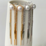 Long chain tassel earrings
