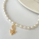 Fresh water pearl necklace with nursing pendant