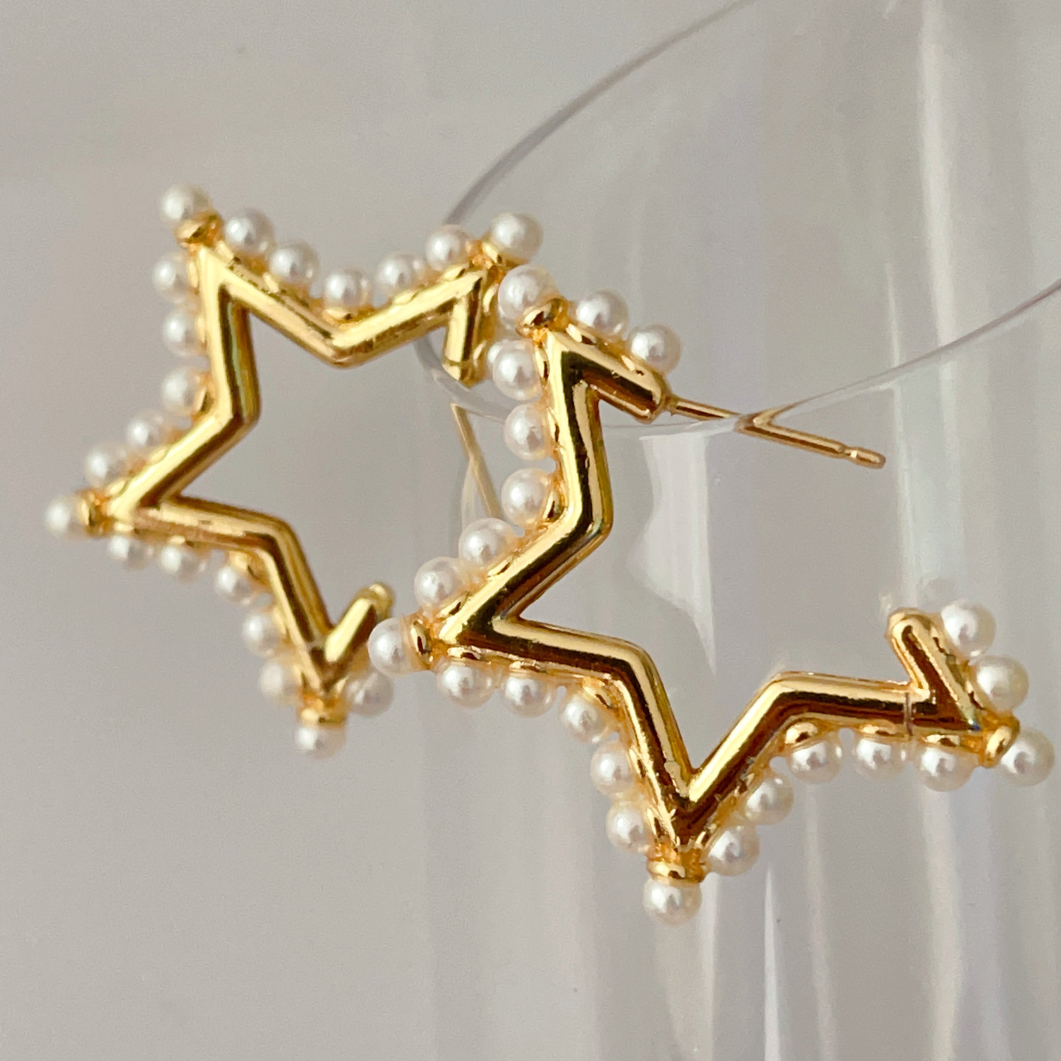 Star pearl earrings