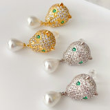 Lion pearl drop earrings