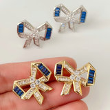 Pave blue bow earrings