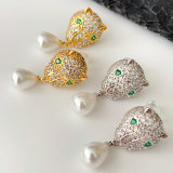 Lion pearl drop earrings