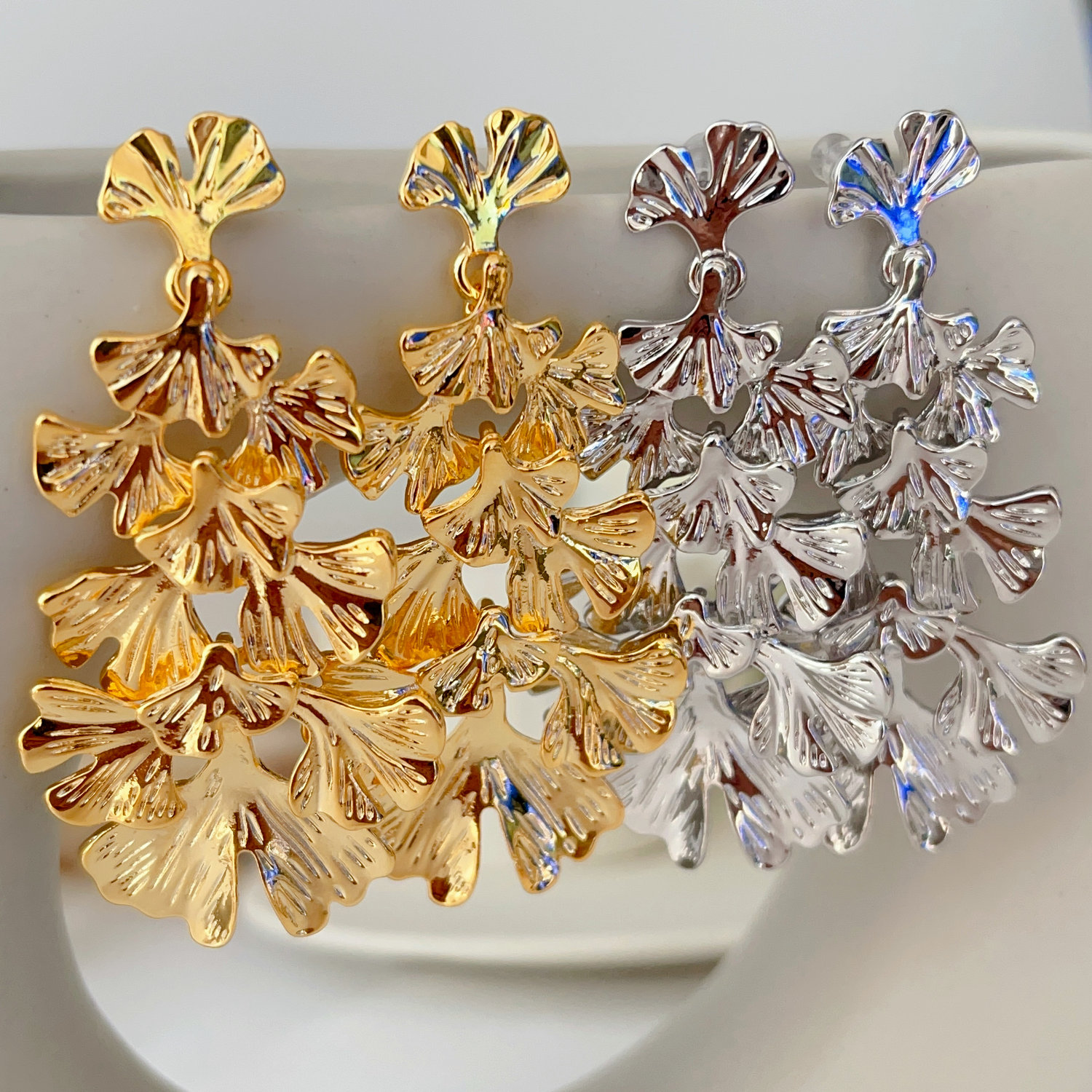Long metal leaf earrings