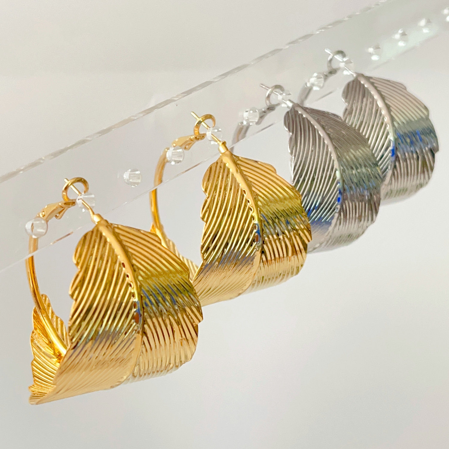 Big leaf hoops earrings 34mm