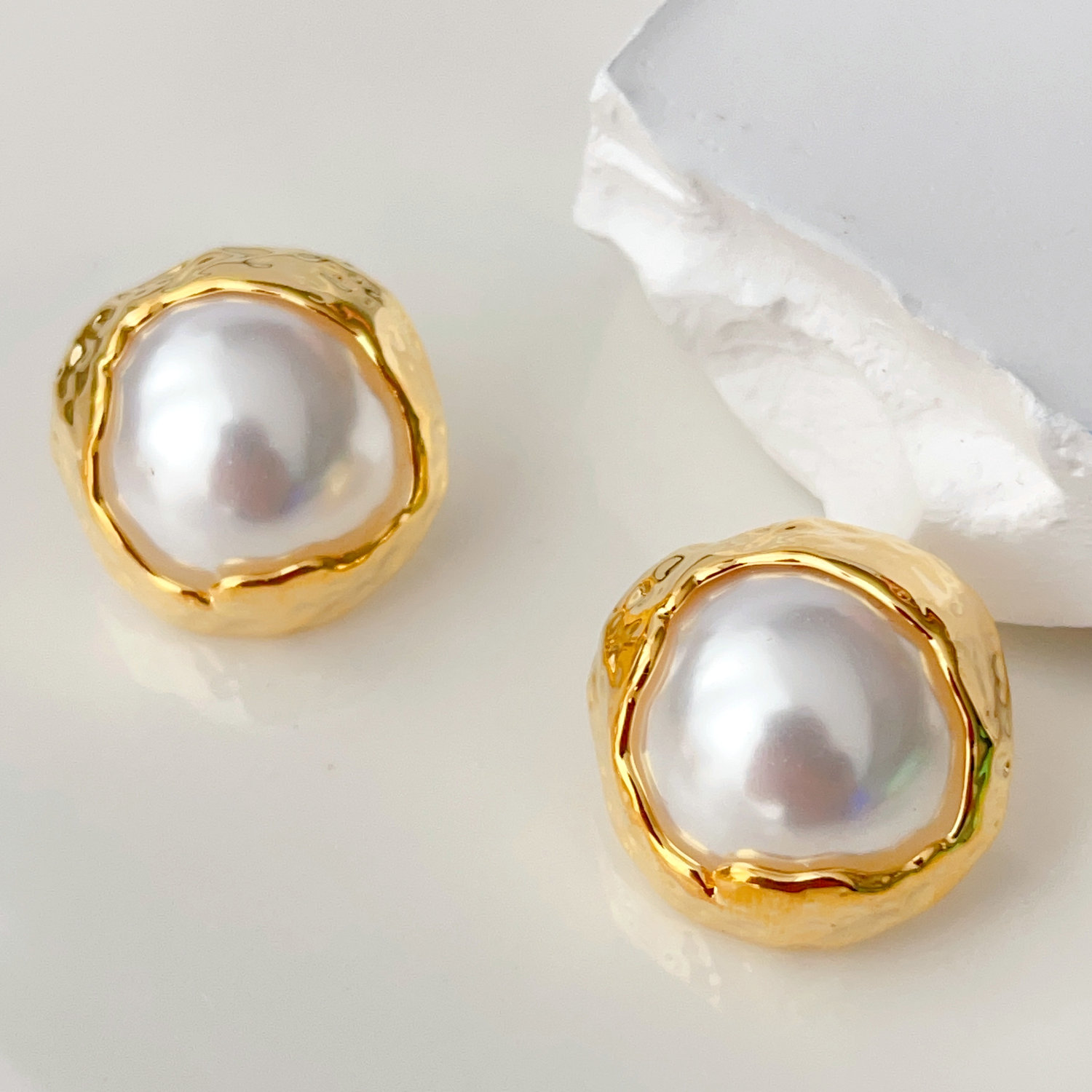 Round pearl earrings