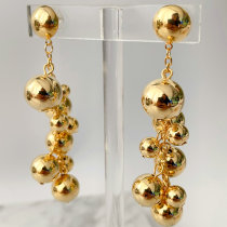 Long gold ball earrings