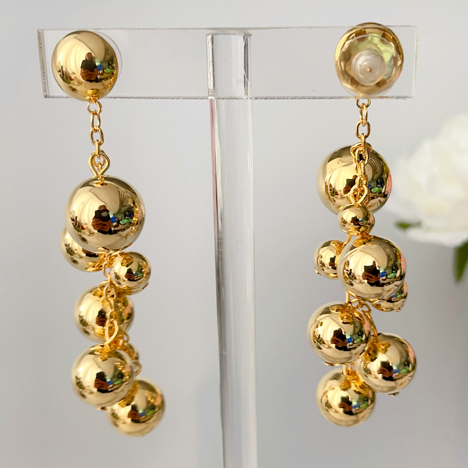 Long gold ball earrings