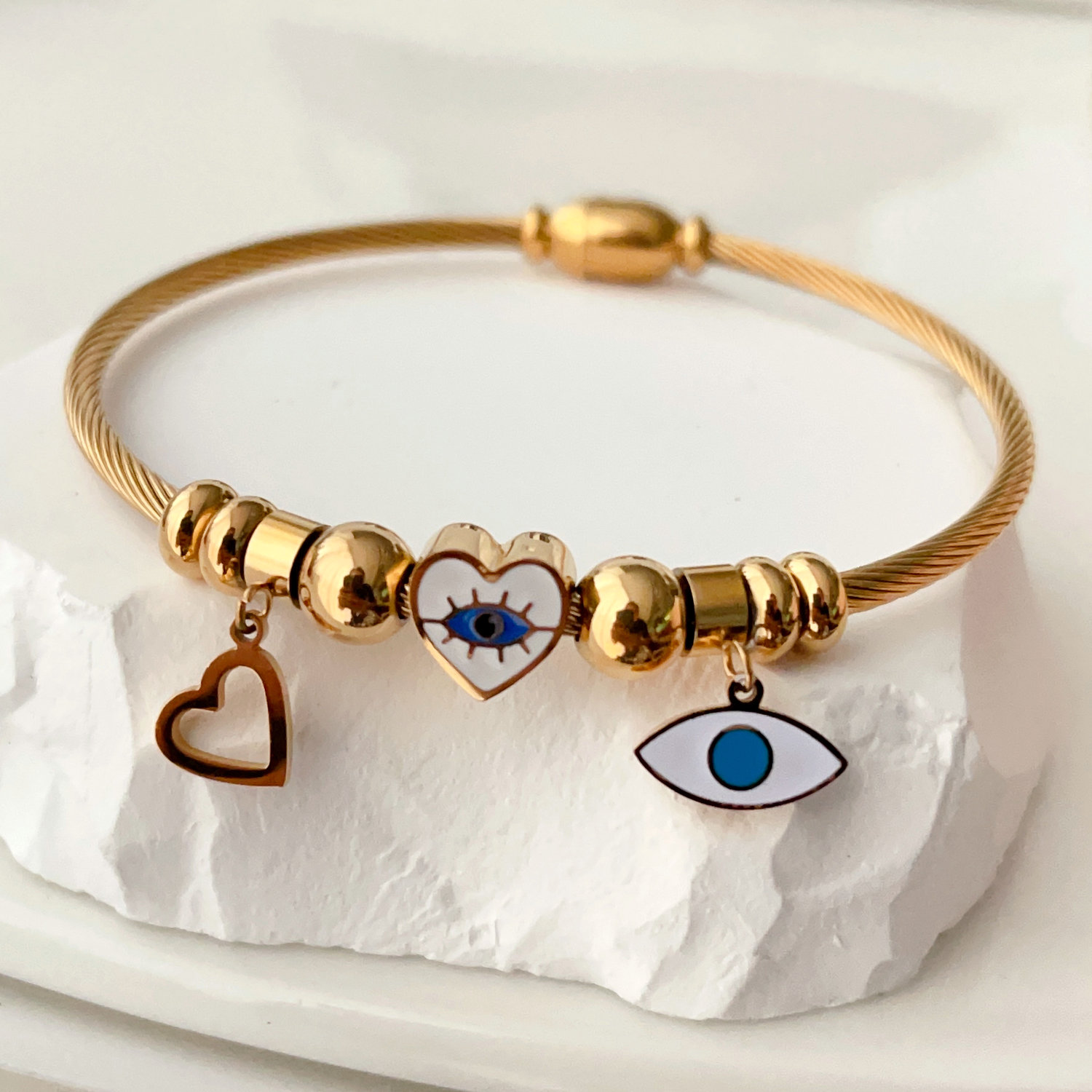 stainless steel bracelet with evil eye charm