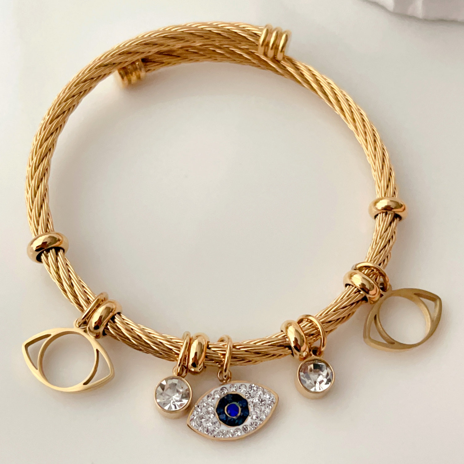 stainless steel twist bracelet with eye charm