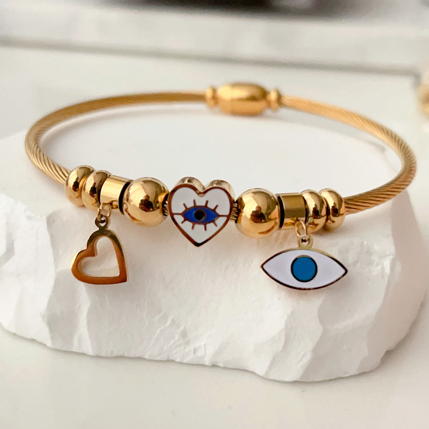 stainless steel bracelet with evil eye charm