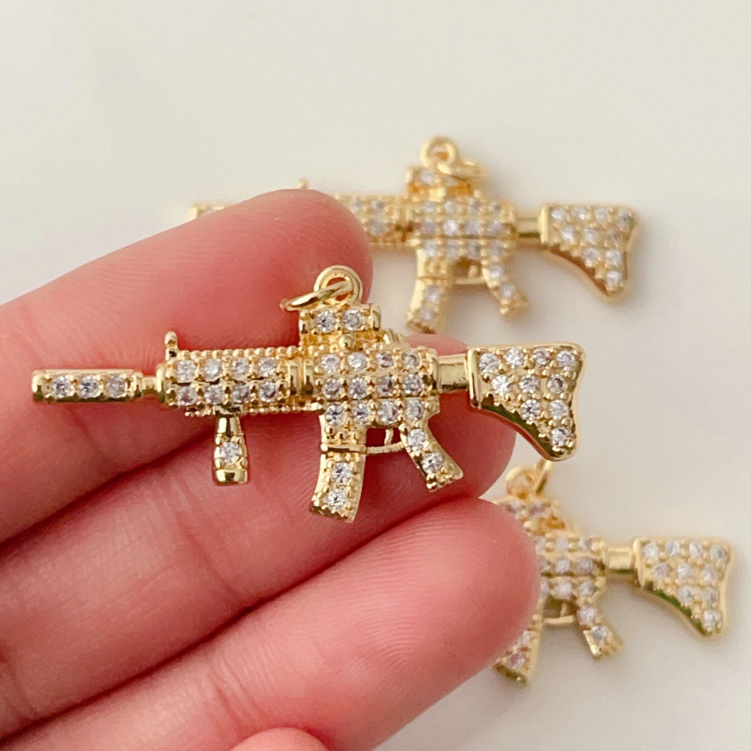 Pave submachine gun pendant