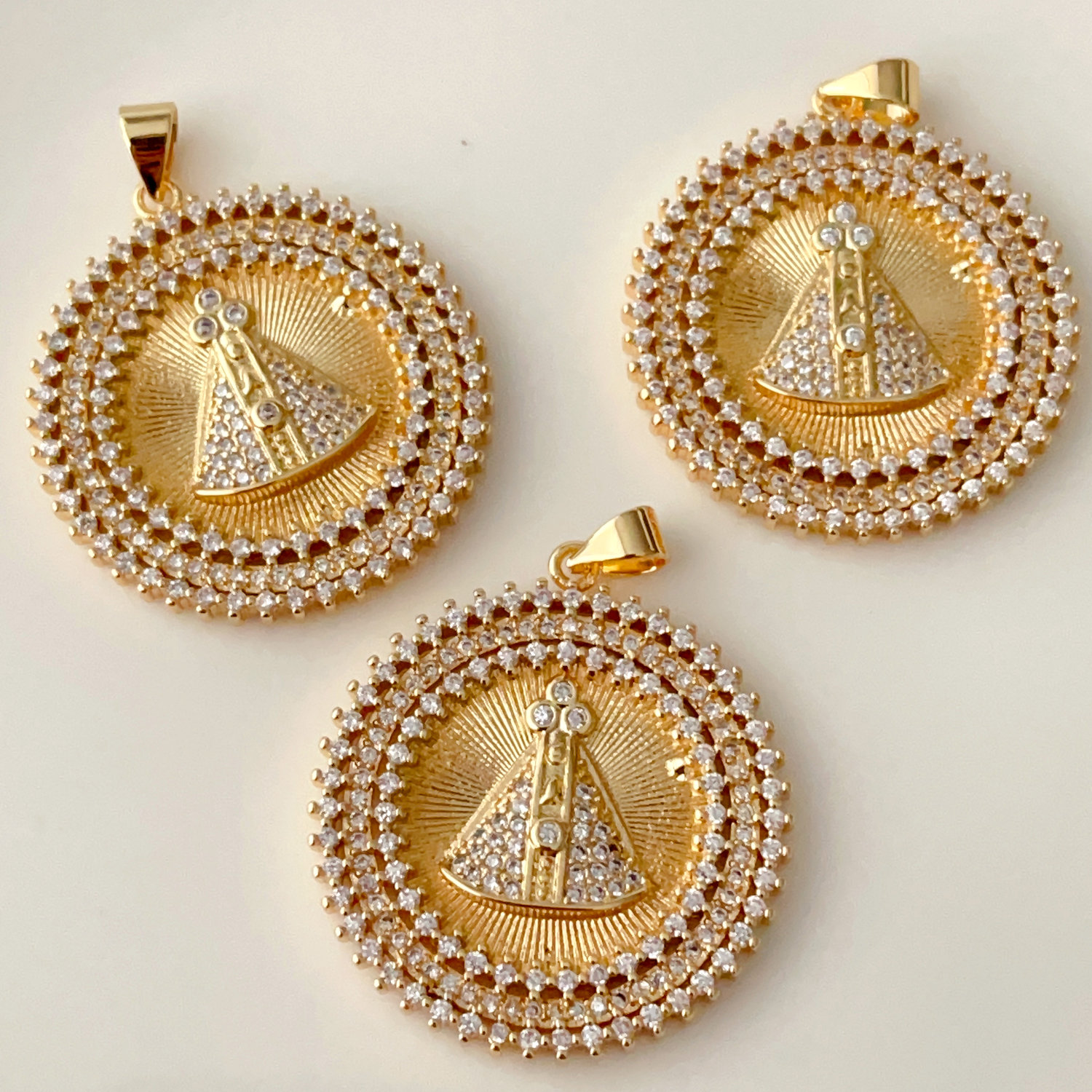 Pave Religion charm