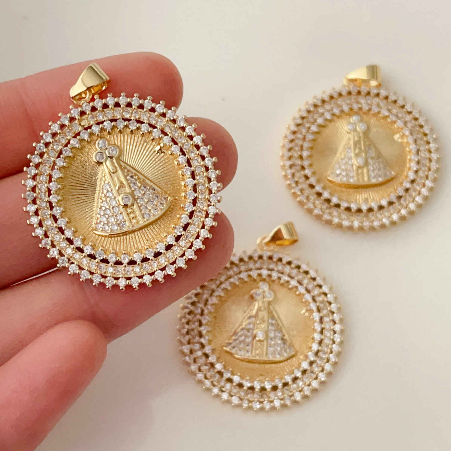 Pave Religion charm