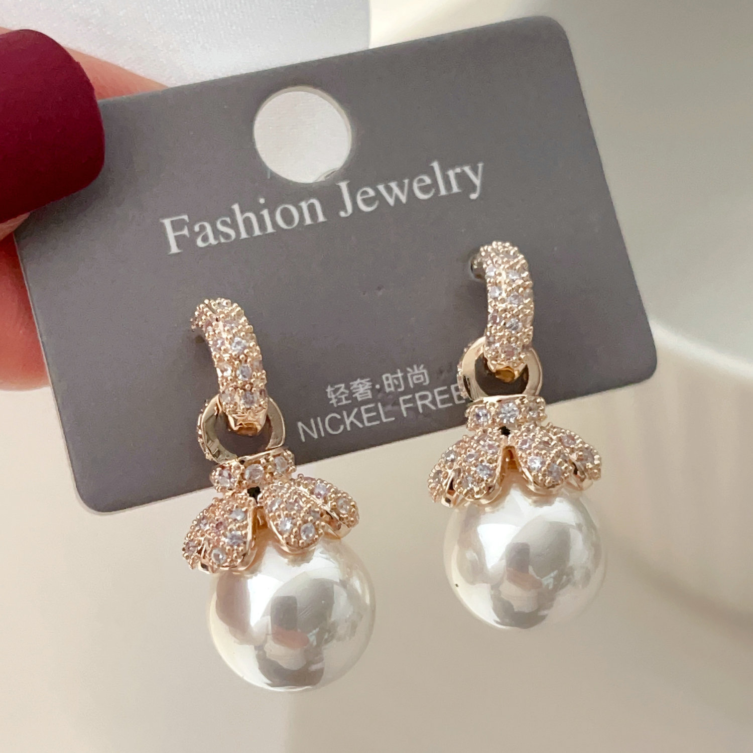 Pave flower pearl earrings
