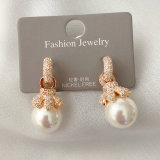 Pave flower pearl earrings